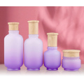 Matte purple glass bottles with wooden color cap